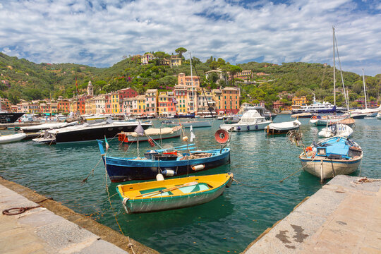 Colorful harbor with traditional boats and buildings in Portofino, Italy, Liguria region