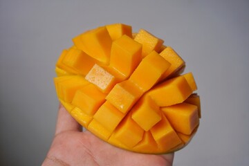 Slice of mango with white background