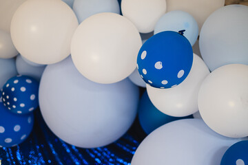 Soft blue, dotted navy and white balloons for party and celebration