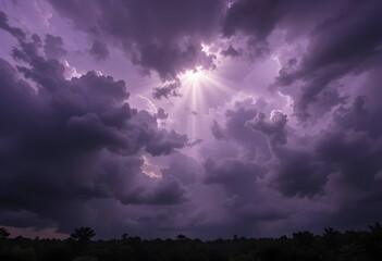 Dramatic Purple Sky with Bright Sun Rays Breaking Through Dark Storm Clouds Heaven Concept