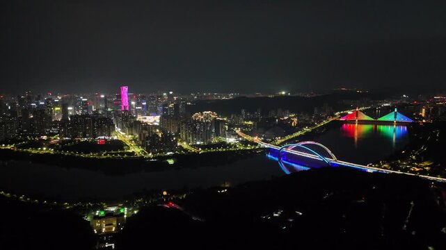 A Symphony of Light and Structure: Night Aerial View of Nanning's Landmark Bridge