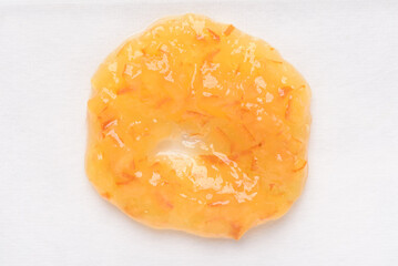 Orange fruit jam for a classic breakfast on white background