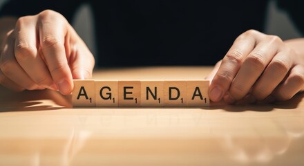 Agenda Set in Wooden Blocks for Meeting Planning and Business Strategy