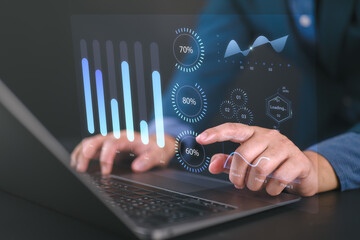 Finance and return on investment concept. Businessman touching on a virtual screen of data and charts, investments analysis in assets and financial growth graphs, business strategy analysis.