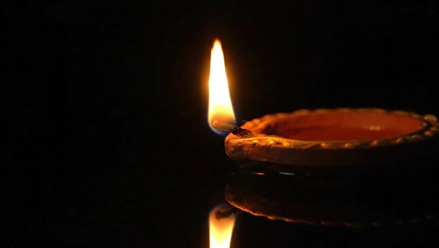 traditional indian diya lamp burning brightly