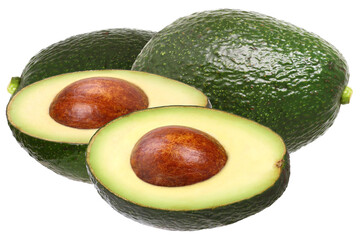 group of fresh hass avocados featuring two whole fruits and one cut in half revealing the large brown pit and creamy green flesh, isolated on black.