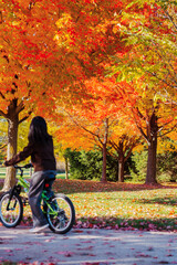 young woman riding bicycle
