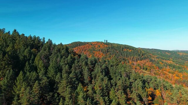 Aerial shot revealing the Rochebaron Castle near Bas en Basset on a sunny day during the fall season, Haute Loire departement, Auvergne Rhone Alpes region, France