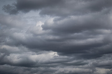 dramatic sky and gray clouds before the storm.	