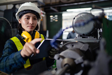 A woman wearing a yellow helmet
