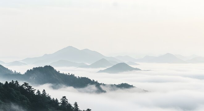 Chinese New year, Aerial view of mountains covered in fog, misty landscape nature - Powered by Adobe