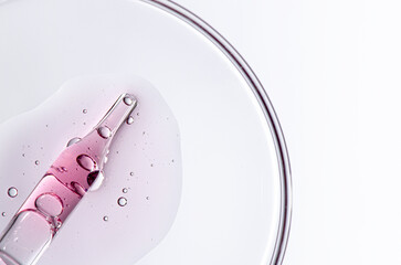 A sample of body cosmetics in a Petri dish. Copy space