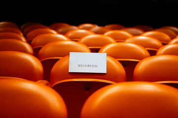 Reserved seating in an empty movie theater 