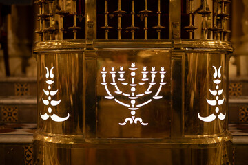 Golden Menorah Symbol on Ornate Synagogue Ark