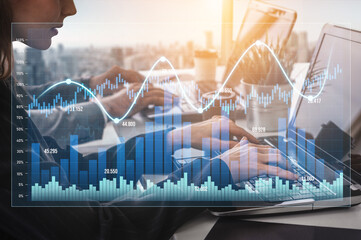 A finance professional engages with dynamic graphs and charts on a laptop, analyzing market trends in a modern office, highlighting data-driven decision-making. Scalp