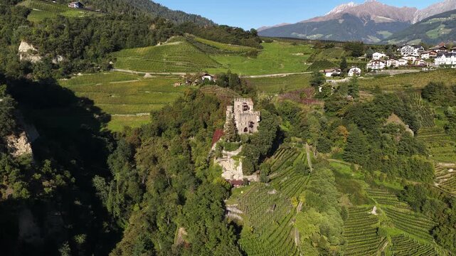Brunnenburg castle in Merno, Tirol, Italy. Aerial drone video.