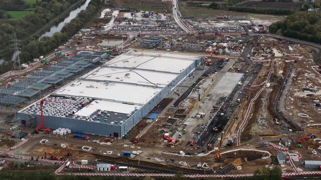 New constructed data center in Farciennes, investment of 1 billion euros, AI and artificial intelligience infrastructure. Aerial video.