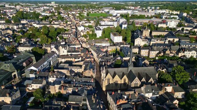 Saint-V&eacute;n&eacute;rand church aka &Eacute;glise Saint-V&eacute;n&eacute;rand with a central apse surrounded Laval cityscape from above, Mayenne, France.
