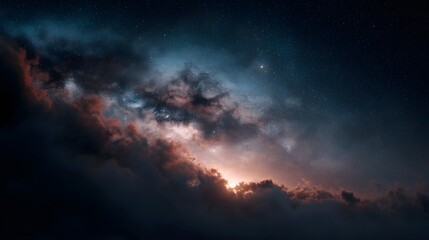 A majestic view of a colorful nebula and stars within the vast expanse of the universe