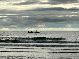 fishing boat at sunset