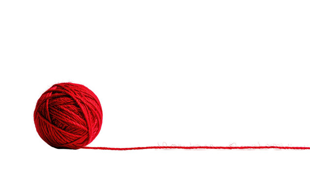 Bright red yarn ball with string trailing on a black background, textured, soft, and inviting, minimalist - Powered by Adobe