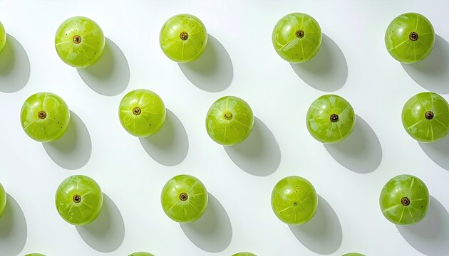 Arrangement of Gooseberries with Natural Lighting and Soft Shadows on a White Surface