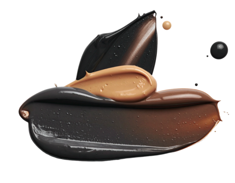 Brown and black cosmetic swatches on a dark surface