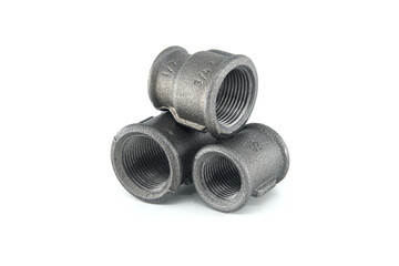 Stack Of Metal Threaded Pipe Fittings For Plumbing And Industrial Use