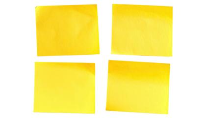 Four yellow square sticky notes on black background