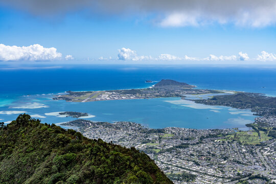 In the distance is Marine Corps Air Station Kaneohe Bay at Mokapu Point. Moanalua Ridge Trail to the Haiku Stairs (Stairway To Heaven), Honolulu, Oahu, Hawaii. Koʻolau Range / shield