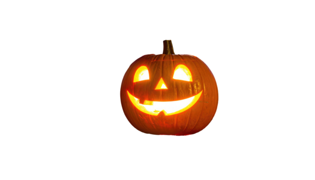 Lit jack-o'-lantern with a triangular nose and smiling mouth against a stark black background