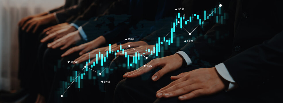 Audience members attentively engage in a business presentation, with a digital graph overlay illustrating financial growth and market trends, symbolizing success. Trope