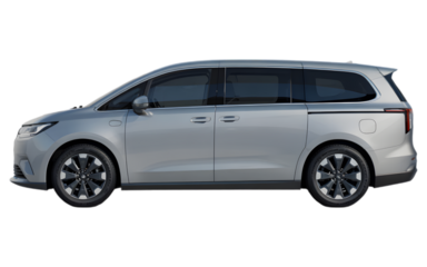 Side profile of a silver electric minivan with a modern, elongated body and stylish alloy wheels
