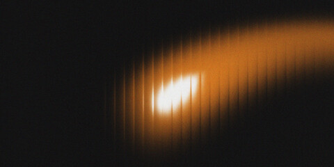 Abstract orange light beam glowing on dark background with soft gradient texture. Futuristic energy...