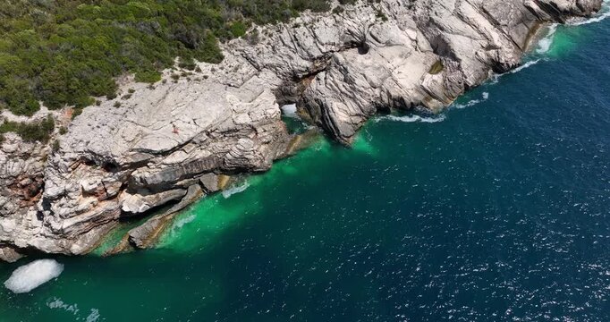 Drone Shot Revealing the Green, Rocky Shores of Dugi Otok Island