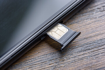 Inserting a modern nano SIM card into a Smartphone