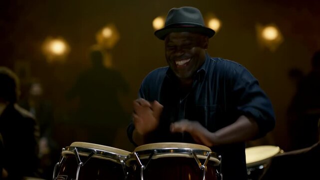 Joyful african american musician playing conga drums