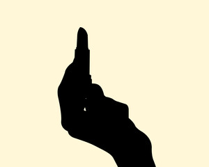 Silhouette of hand holding a lipstick concept design. Icon of cosmetic on the finger. Vector illustration.