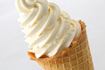 Vanilla soft serve ice cream cone