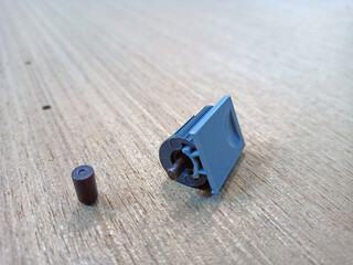 close-up of shelf holders in a furniture factory