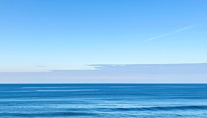 Obraz premium Clear Turquoise Sea Texture With Sun Rays Filtering Through Surface Underwater View With Blue Sky Above And Distant Contrail