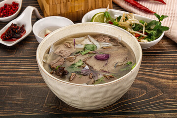 Vietnamese Pho Bo soup with beef and noodles