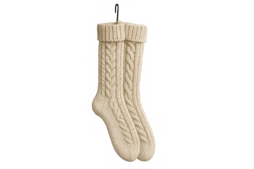 Pair of soft beige cable knit socks hanging, showing warmth and comfort for cold weather seasons. Transparent background