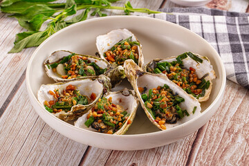 Gournet grilled oysters with onion and peanut