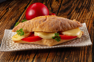 Sandwich with mozzarella and tomato