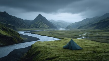 A serene camping scene by a river in a lush valley, surrounded by misty mountains and dramatic skies.