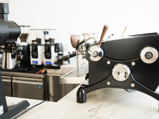 Professional like coffee making machine on table in cafe. Espresso machine