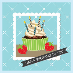 Happy birthday card with cupcake, candles and strawberry