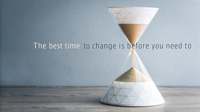 Abstract Hourglass with Sand Flowing Upward Symbolizing Growth