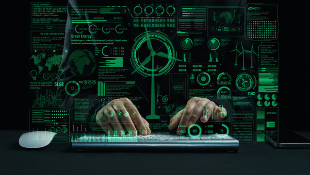 Hands type on a keyboard while green digital screens showcase data and infographics related to renewable energy, illustrating innovation and technological advancement in sustainability. Cipher - Powered by Adobe